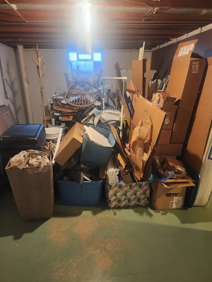 Roll-off dumpster container at job site for 2 Yard Dumpster Rental in Yucca Valley